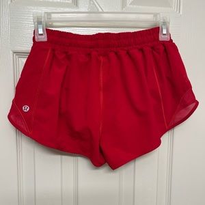 Lululemon 2.5” low-rise Hotty hot shorts. Color: Dark Red. Size: 6
